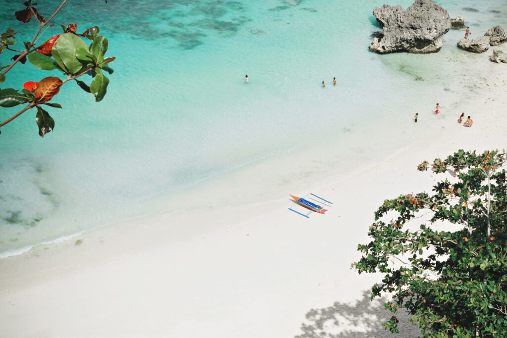 Kids playing on the seaside of Boracay