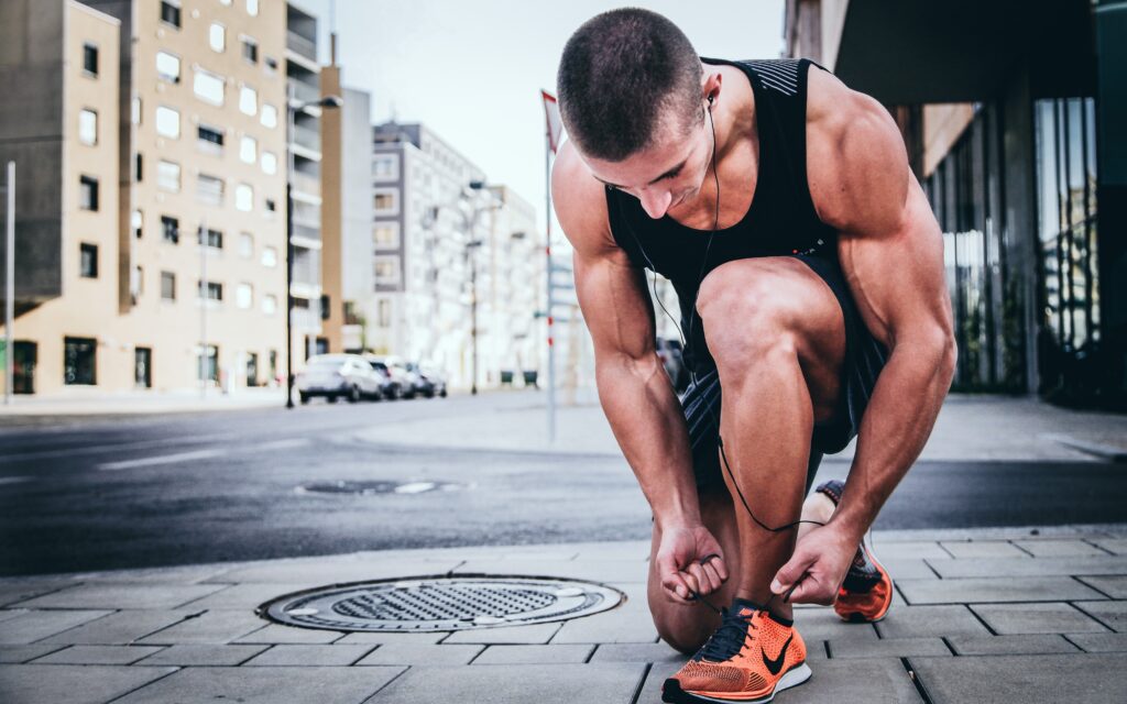 A man tying his shoes