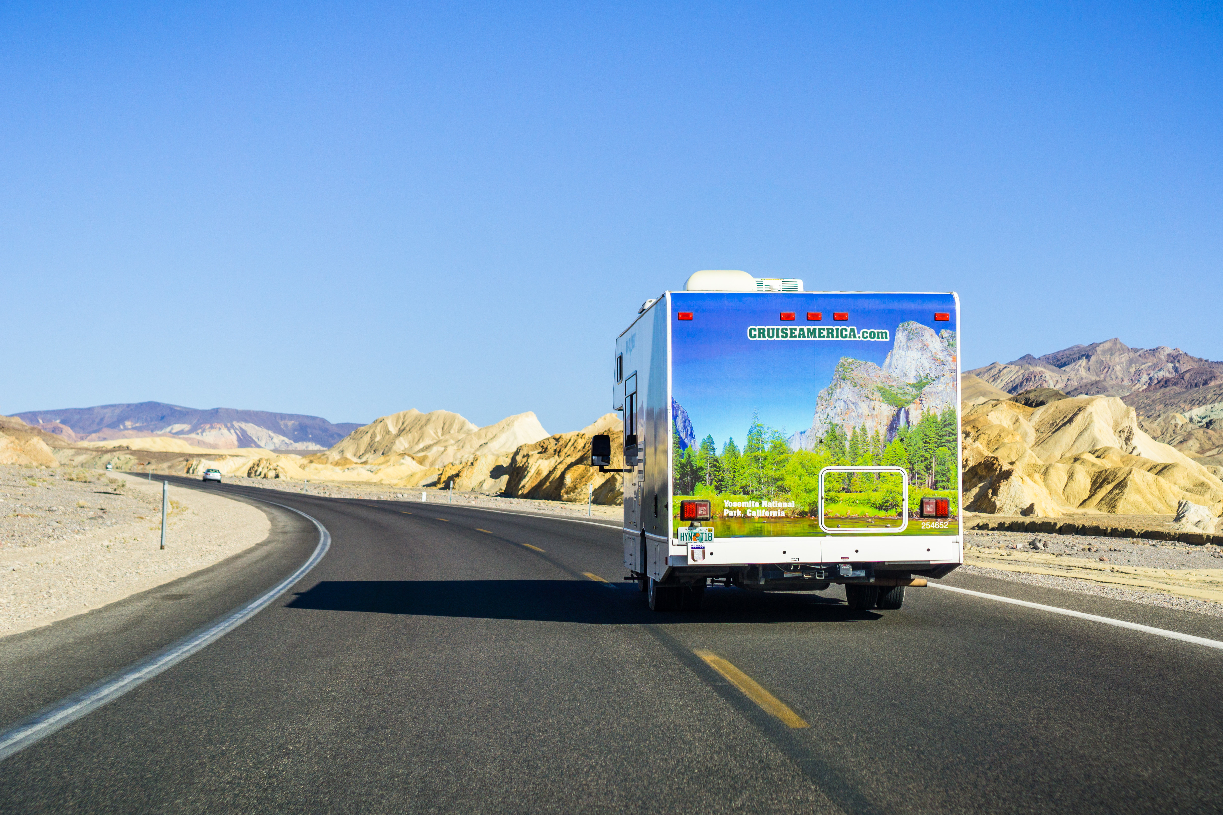 Cruise America RV camper traveling through Death Valley National Park