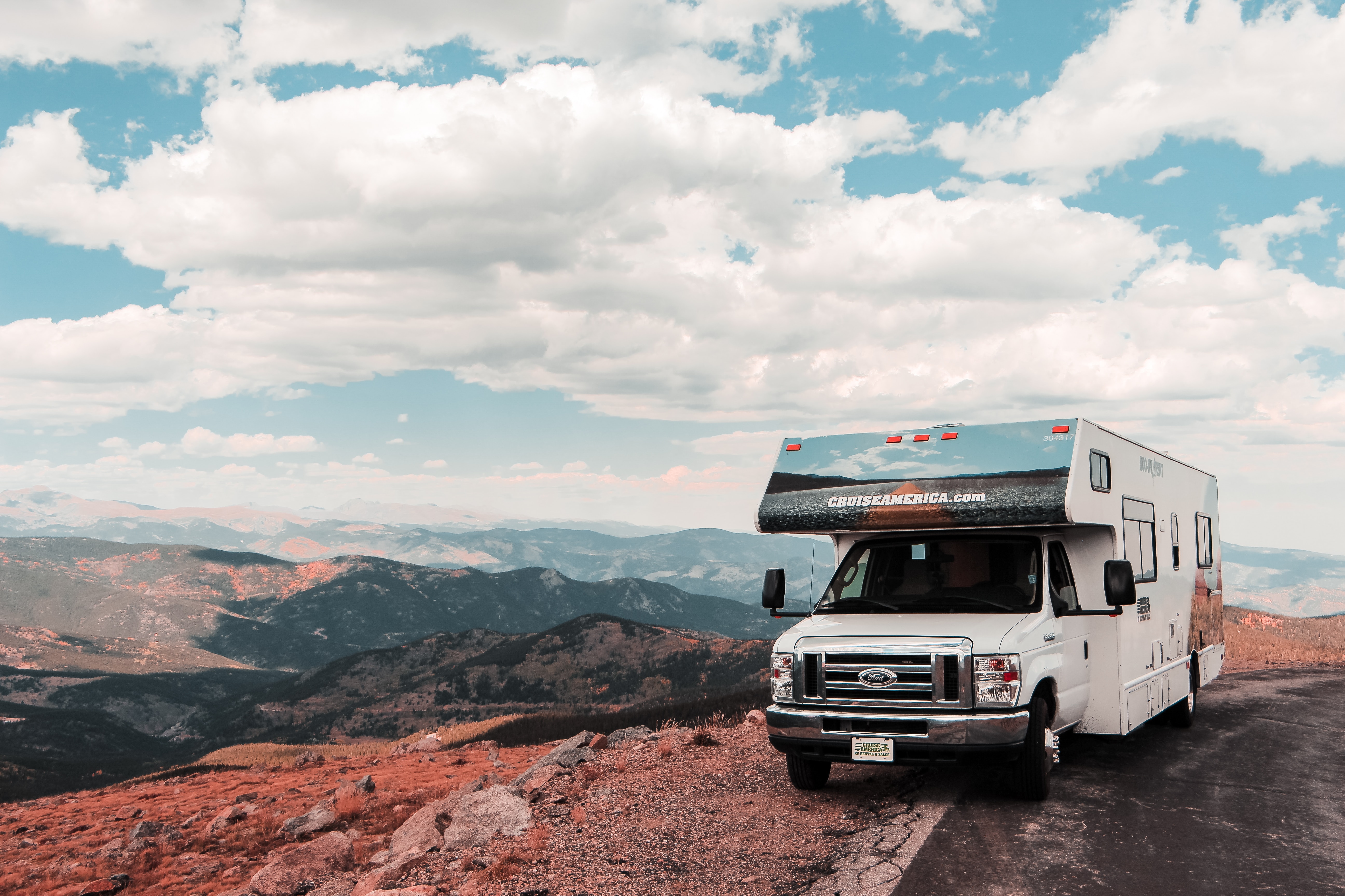 Cruise America Camper parked on a road side