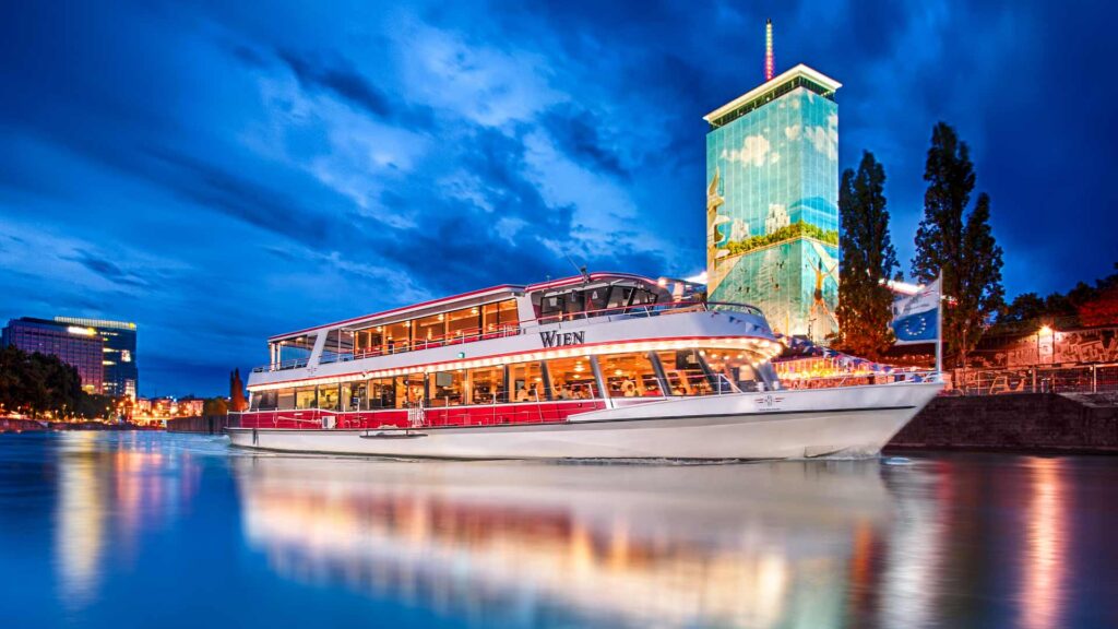 A cruising boat by a river