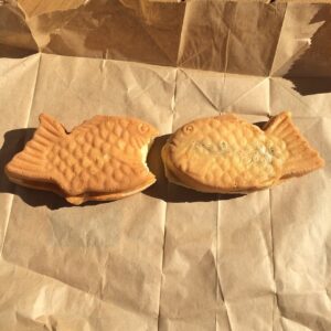 Two goldfish-shaped breads.