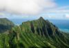 Green mountains overlooking the sea in the Jurassic Park Hawaii.