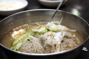 A bowl of naengmyeon or cold buckwheat noodles