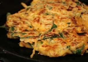 Korean pancakes stuffed with vegetables.