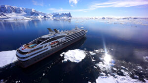 A cruise ship in the middle of iceberg.