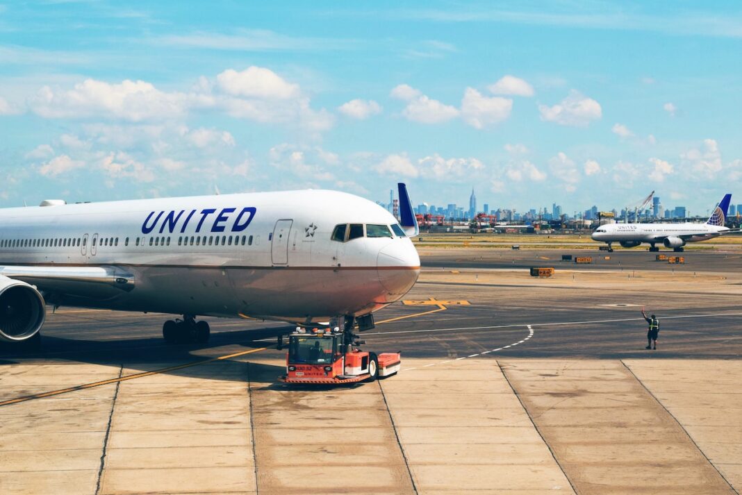 United airline jet plane boeing-777 on the airport runway