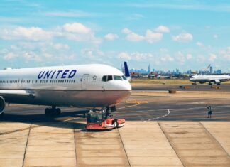 United airline jet plane boeing-777 on the airport runway