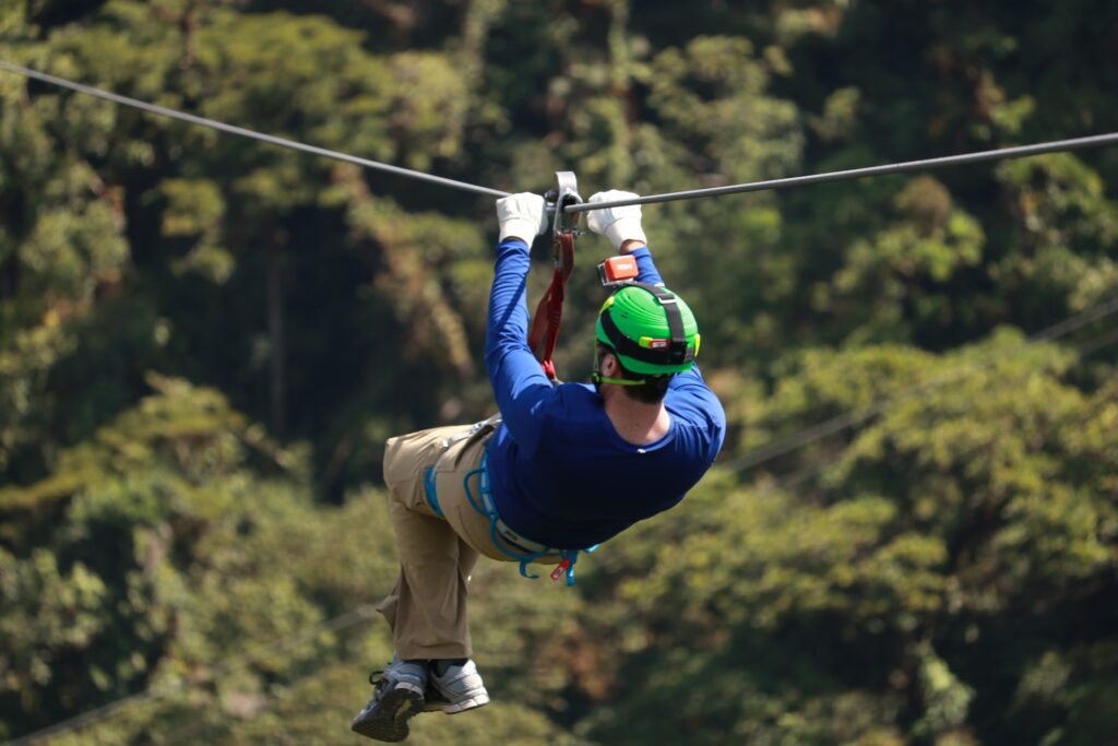 A guy riding a zipline