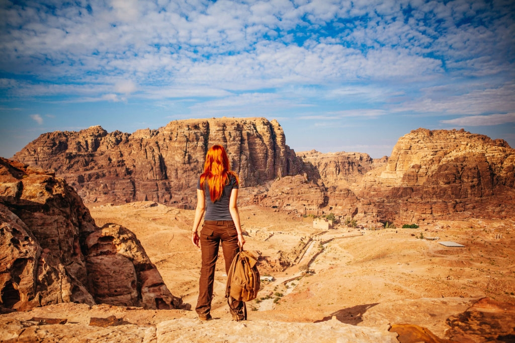 Female hiker hiking in Wadi Rum, Jordan 