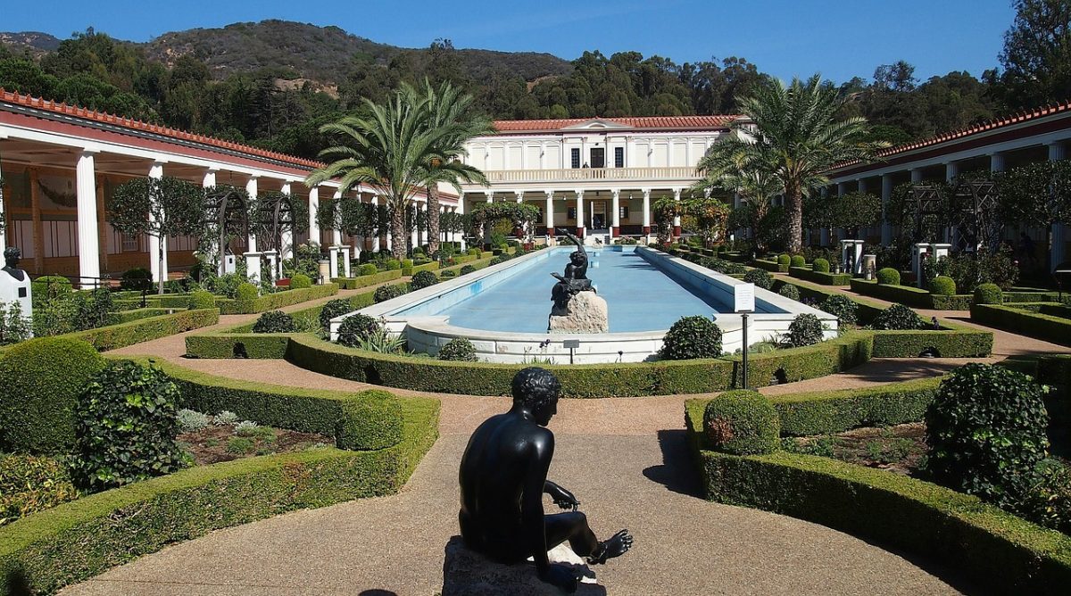 Panoramic view of the Getty Villa with fountains and statues