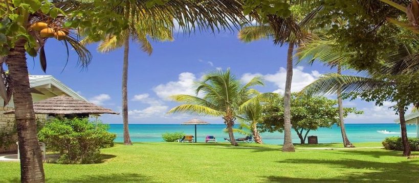 Beachfront view of the Hawksbill Antigua clothing optional resorts