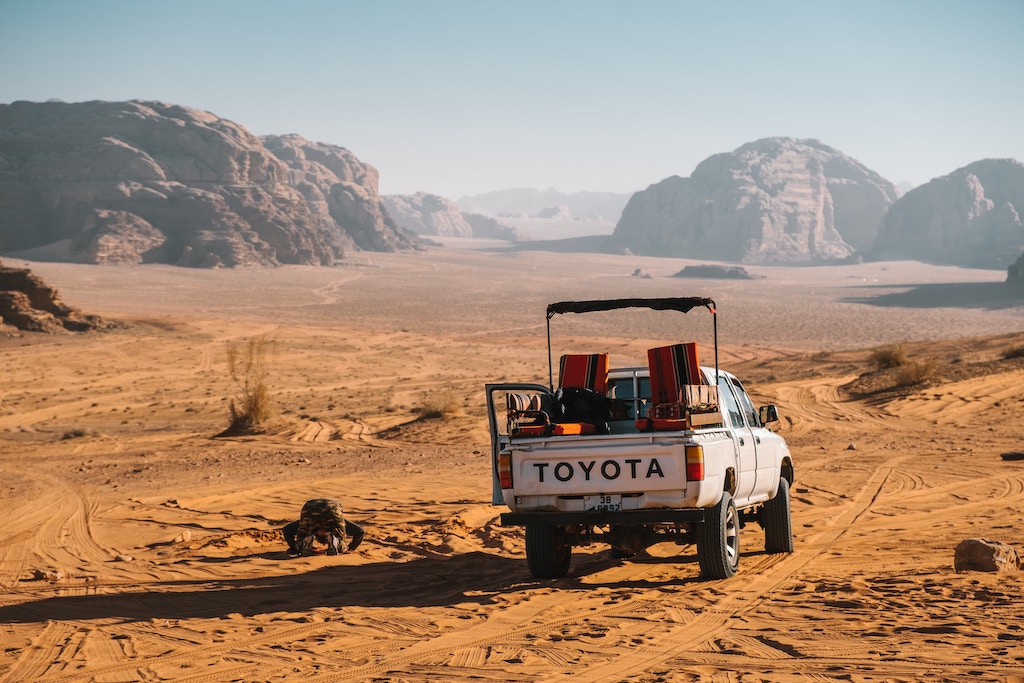 A Toyota Jeep parking in Wadi Rum desert 