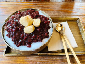 Korean mochi with red bean paste topped on a Korean shaved ice