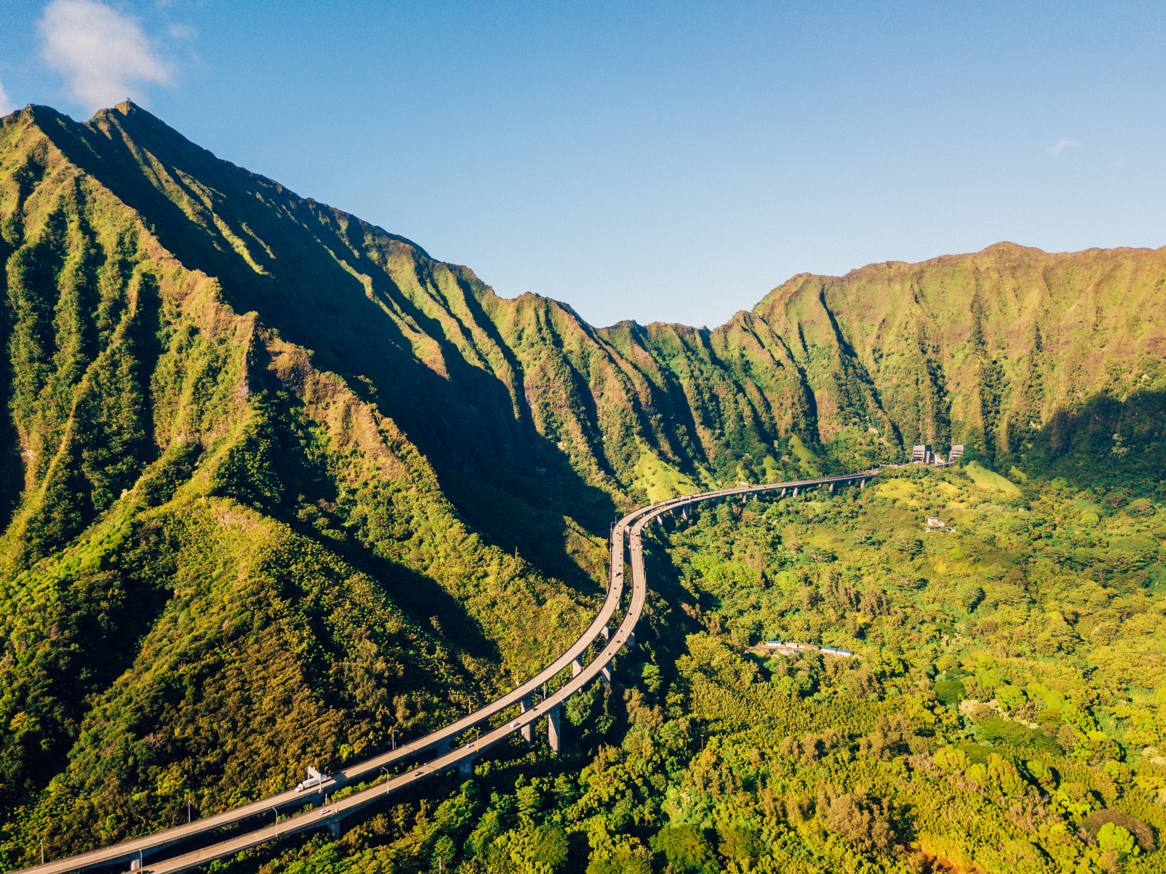 A train track next to the mountain in Kualoa Ranch