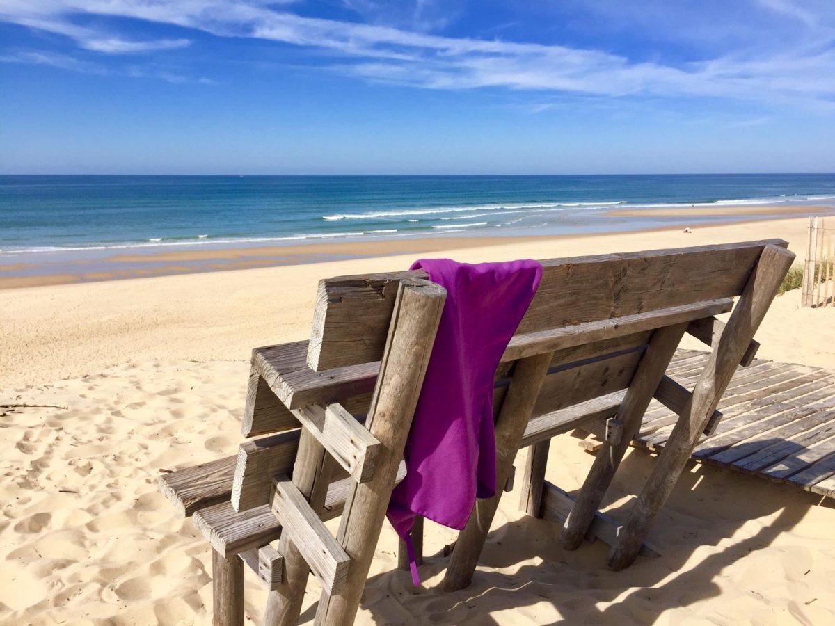 Beach chair on a beach during with clear blue sky for sun tanning