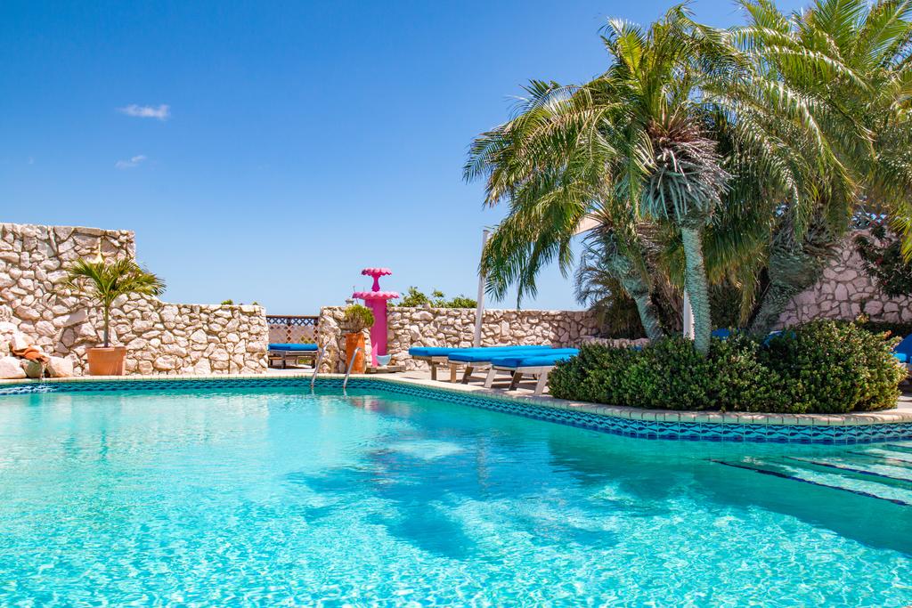 Outdoor pool in a villa of the natural Curacao Caribbean