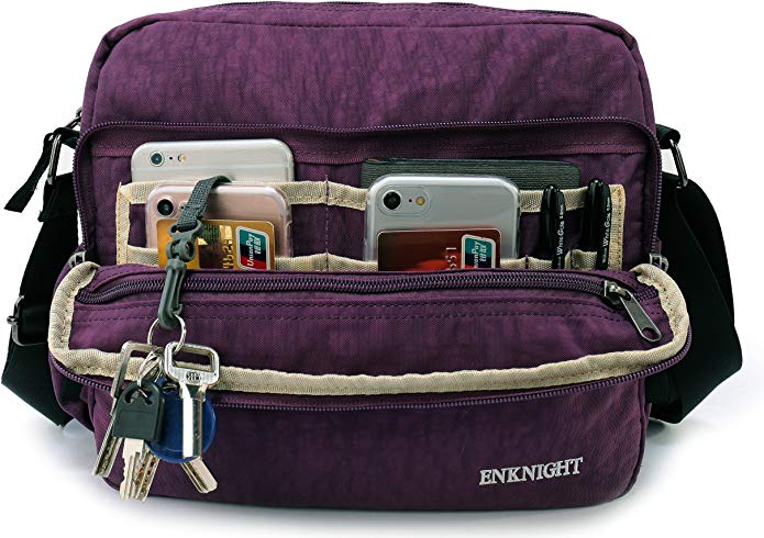 Purple coloured Enknight RFID Travel Crossbody bag stuffed with credit cards and iPhones.