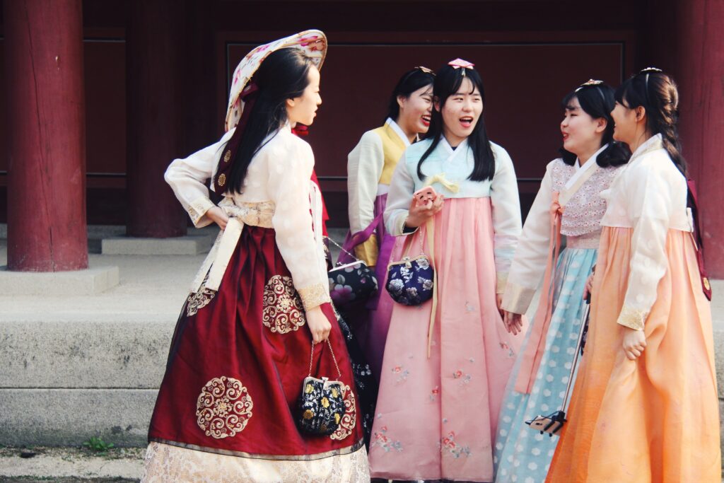 A group of girls wearing Hanbok, the traditional attire of Korea.