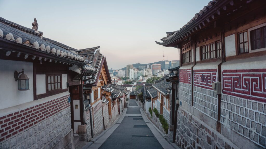 An empty street in a Hanok village, a traditional Korean neighborhood.