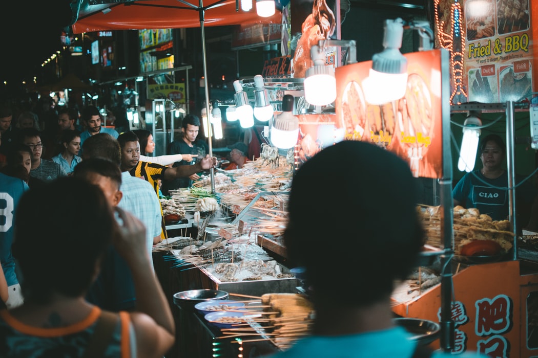 Street vendors at KL night market.